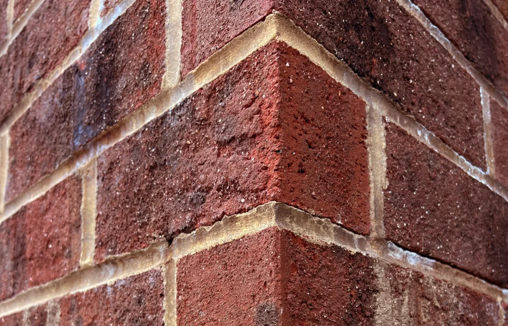Close-up of red brick wall
