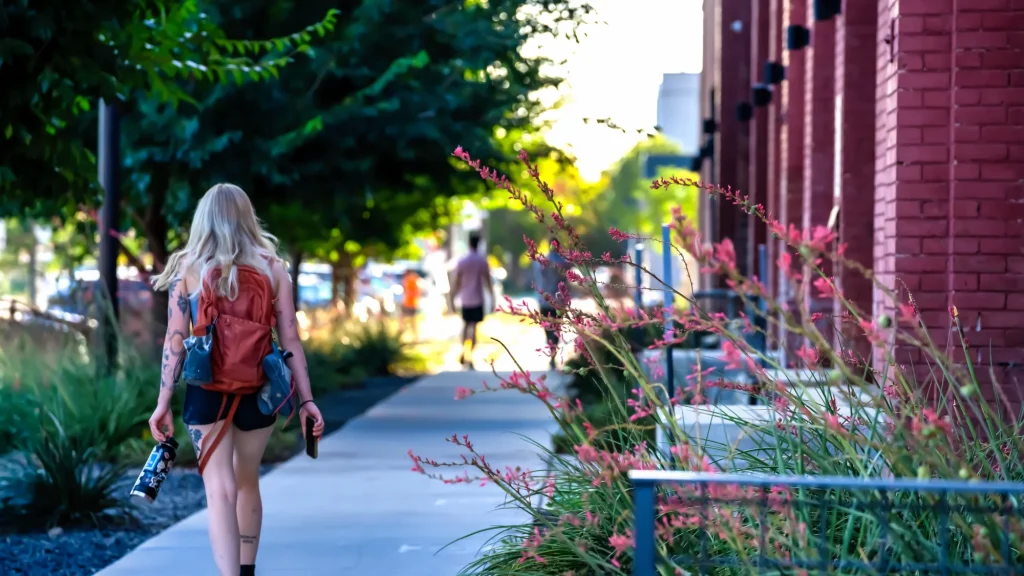 Girl walking down SLC street